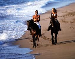 Horseback_riding_couple.jpg